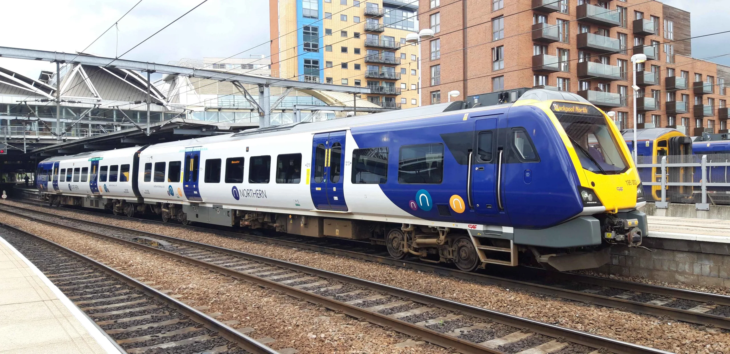 Photo of a Nothern Rail Train. Photo by Jon David Houghton, CC BY-SA 4.0 , via Wikimedia Commons